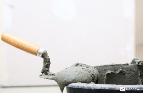 Можно ли клеить плитку на шпаклеванную стену. Подготовка поверхности